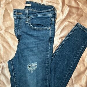 Levi’s high rise super skinny distressed jeans